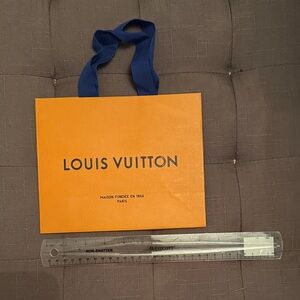 Louis Vuitton Vibrant Orange Bag with Blue Handles